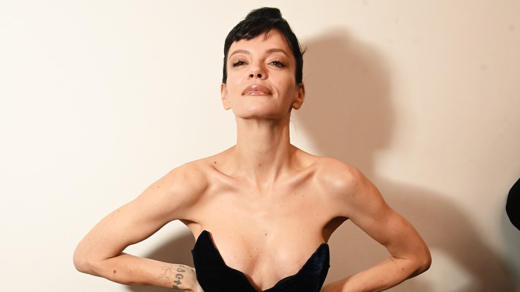 Lily Allen's Sheer Dress Photo Sees Her Pose Cheekily on a Sofa