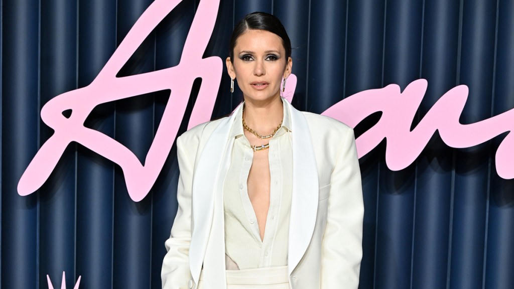 Nina Dobrev Leaves Shirt Unbuttoned, Risks It All in Photos