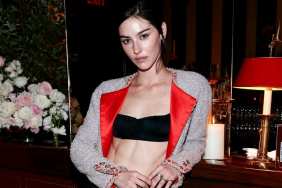 Gracie Abrams' Unbuttoned Shirt Exposes Flirty Bra