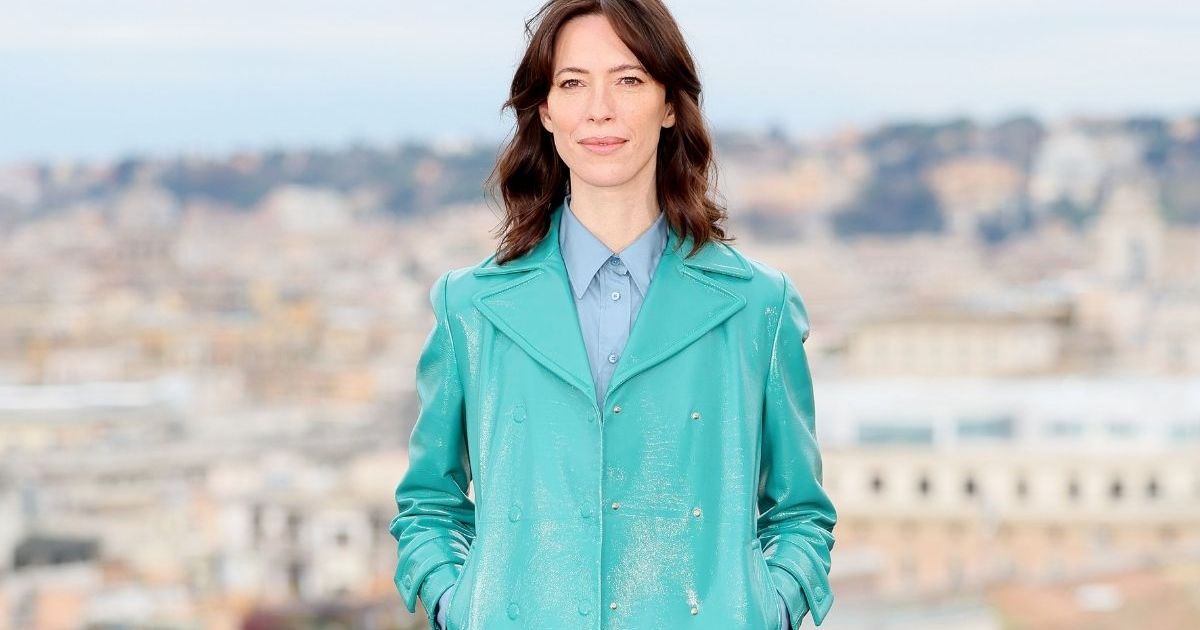 Rebecca Hall’s Fendi Micro Miniskirt Peeks Out From Under Her Coat