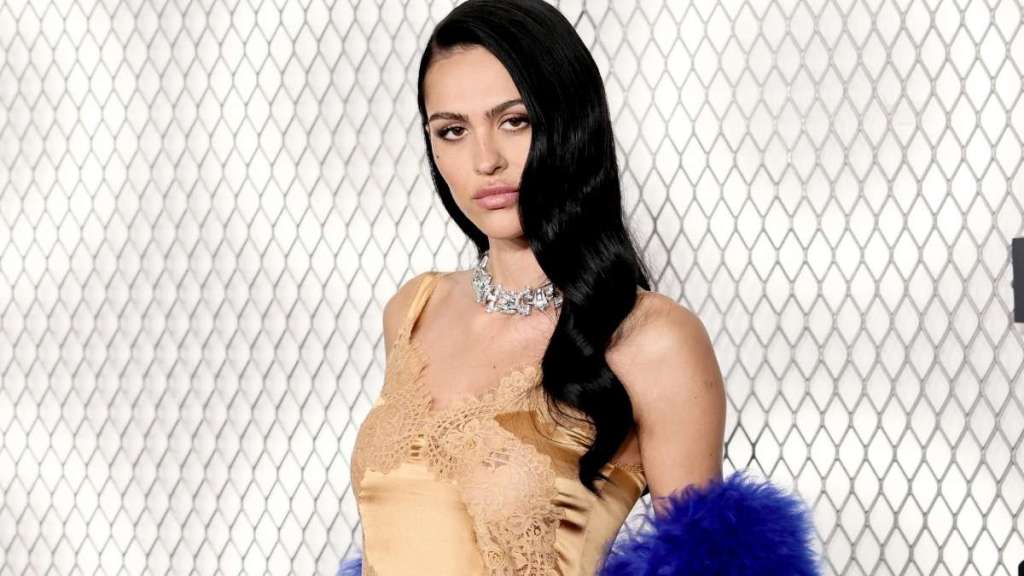 Amelia Gray Pairs Tiniest Lacy Minidress With Dramatic Gucci Coat