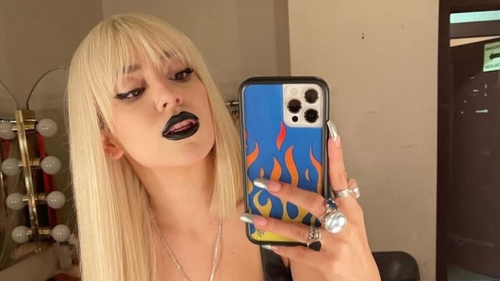 Ava Max Celebrates Hit Milestone, Poses in All-Sheer Dress