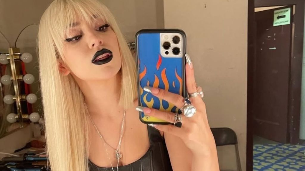 Ava Max Poses in Bodysuit and Boots for New Photos