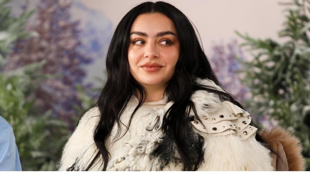 Charli XCX Models Thong Under Fur Coat in New Photo
