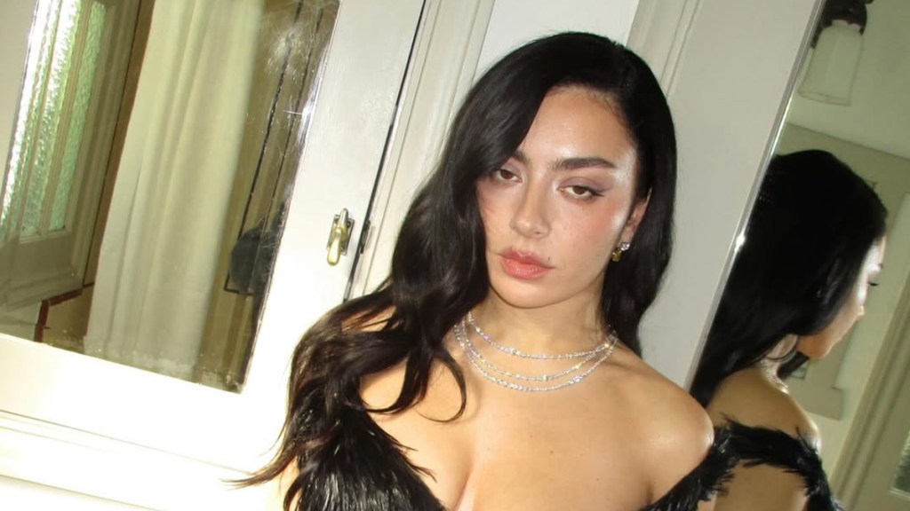 Charli XCX Makes Waves in a Risky, Low-Cut Strapless Top