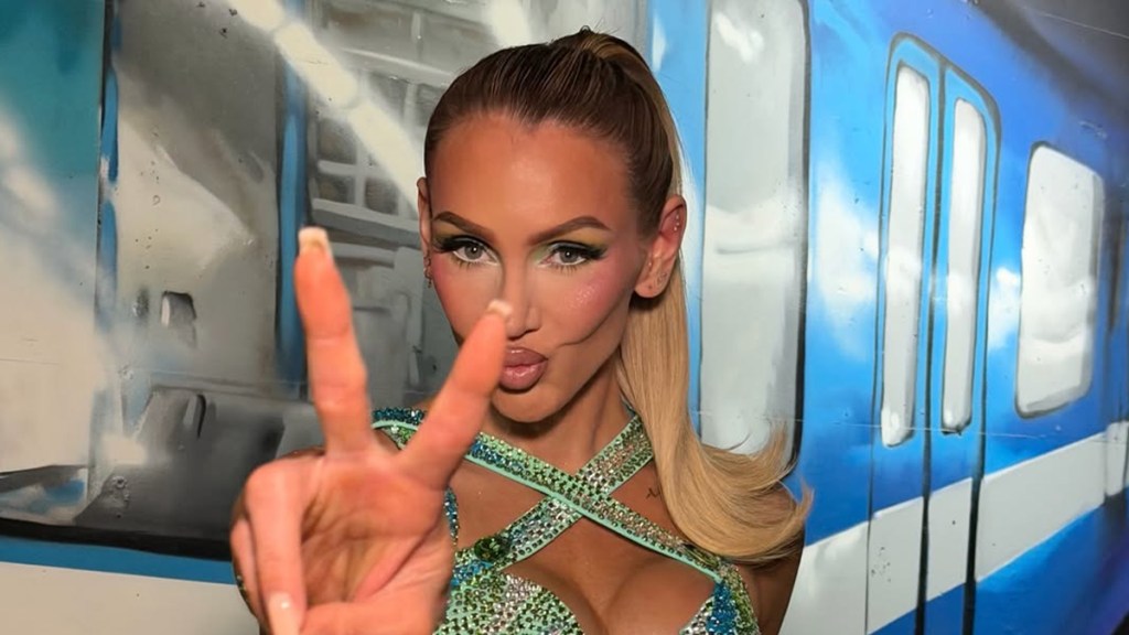 WWE’s Charlotte Flair Shows off Abs in Two-Piece Wrestling Gear