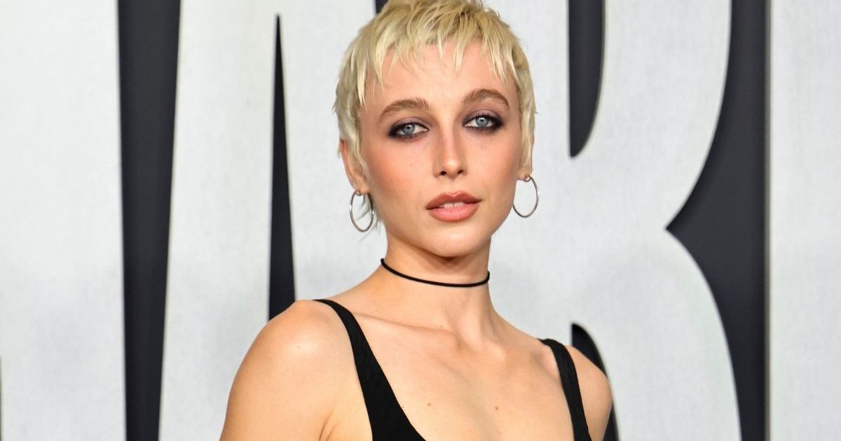 Emma Chamberlain in Strapless Courreges Romper & Boots Is Playfully Chic