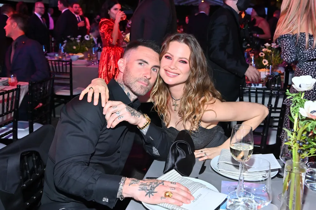 Adam Levine with his wife 