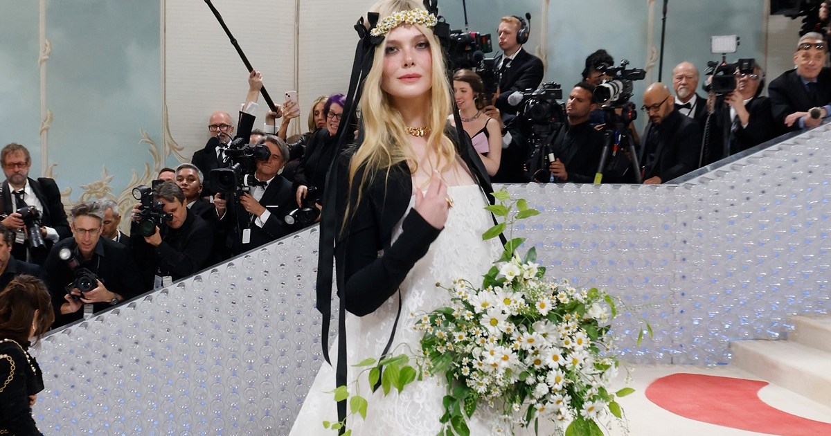 Elle Fanning Repurposes High Slit Gucci Coat as Chic Dress