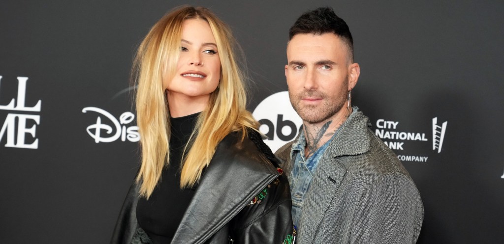 Adam Levine with his wife
