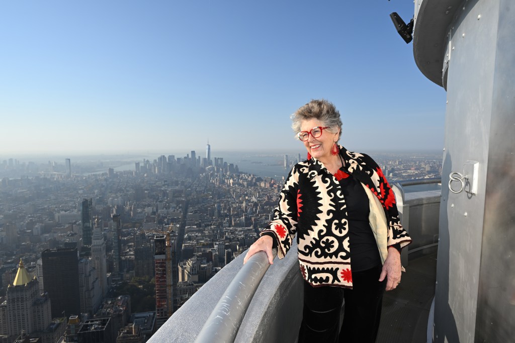 Prue Leith looking over the edge of the Empire State Building