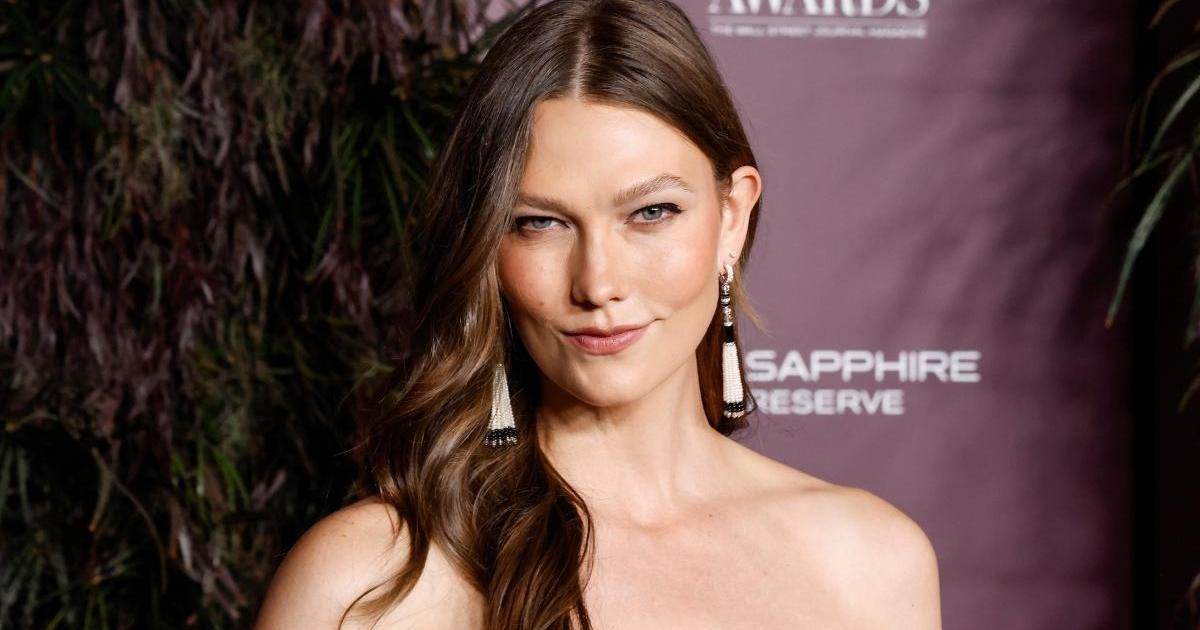 Karlie Kloss Poses on the Floor in Bodysuit &amp; Sheer Tights