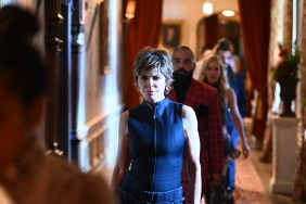 Lisa Rinna walking to the roundtable on The Traitors Season 4