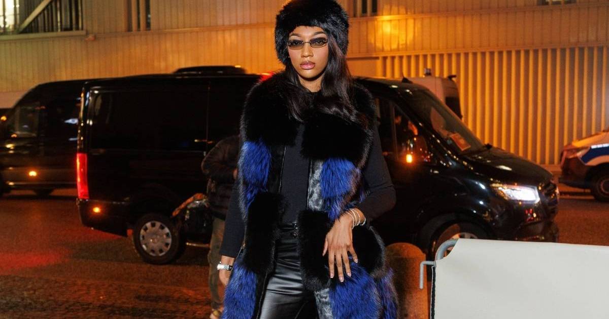 Angel Reese’s Animal Print Minidress & Fur Coat Is So Mob Wife-Coded