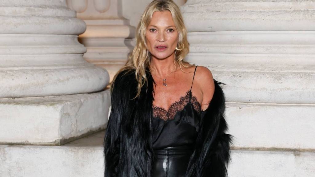 Kate Moss Flaunts Dramatic High Slit Skirt on YSL Show