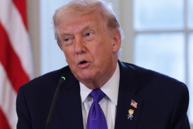 Donald Trump Appears to Flip Off & Say 'F*** You' to Heckler