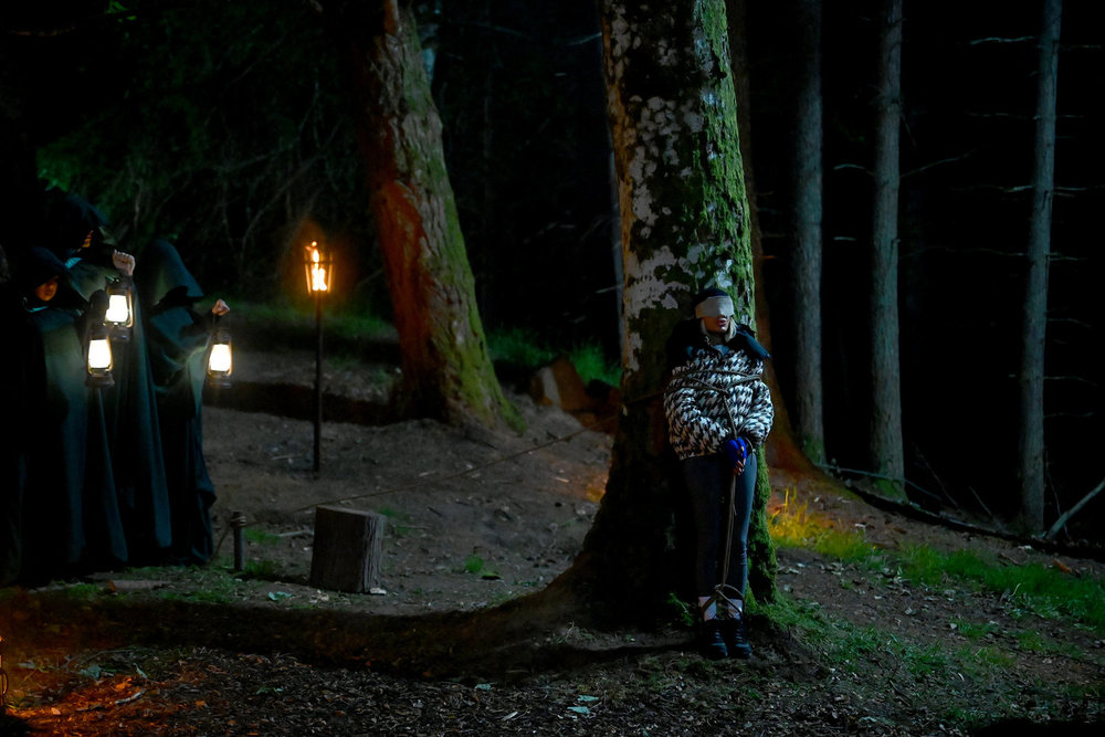 Caroline Stanbury on The Traitors tied up to a tree 