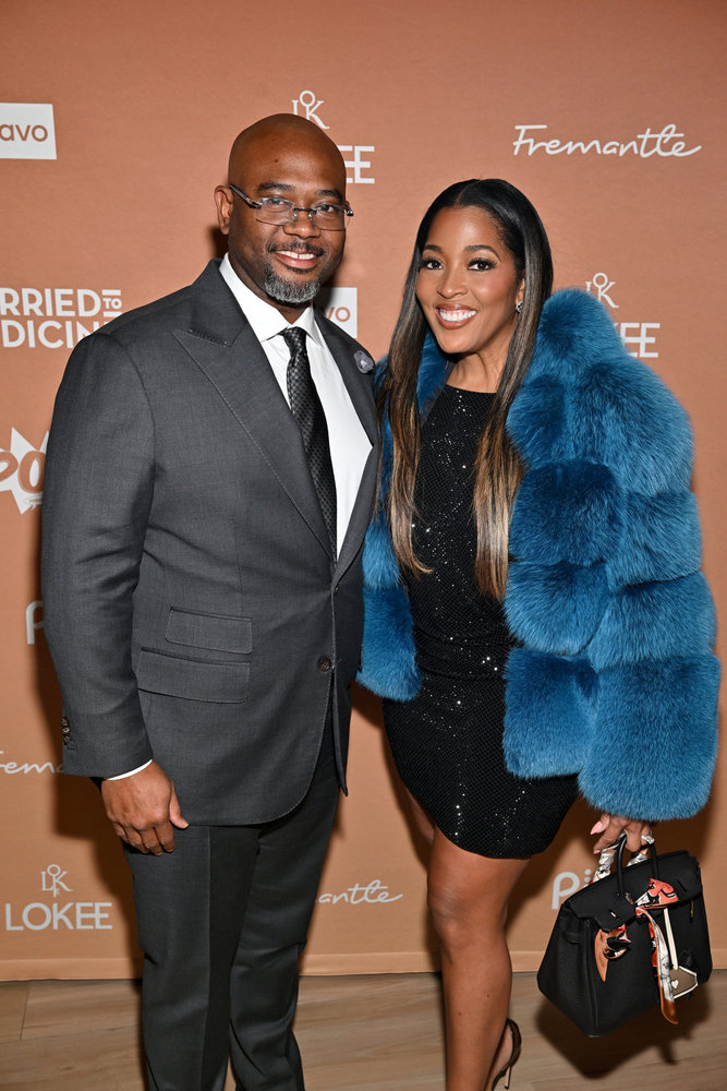 Dr. Eugene Harris and Toya Bush Harris at the Married to Medicine premiere party 