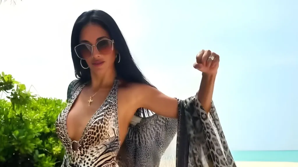 Nicole Scherzinger Raises Temperature in Backless Swimsuit