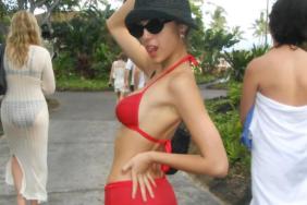 Olivia Rodrigo Begins 2026 in Stringy Bikini Top & Cheeky Micro Skirt