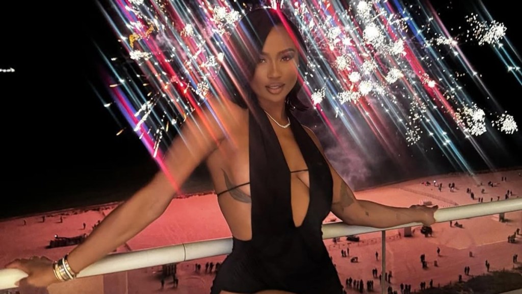 Travis Kelce's Ex Posing in Waist Slit Dress Is a Lot to Take in