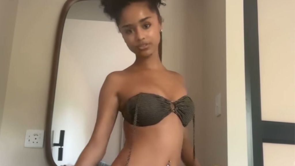 Tyla Dons Bandeau Bikini Top & Unbuttoned Pants in GRWM Video