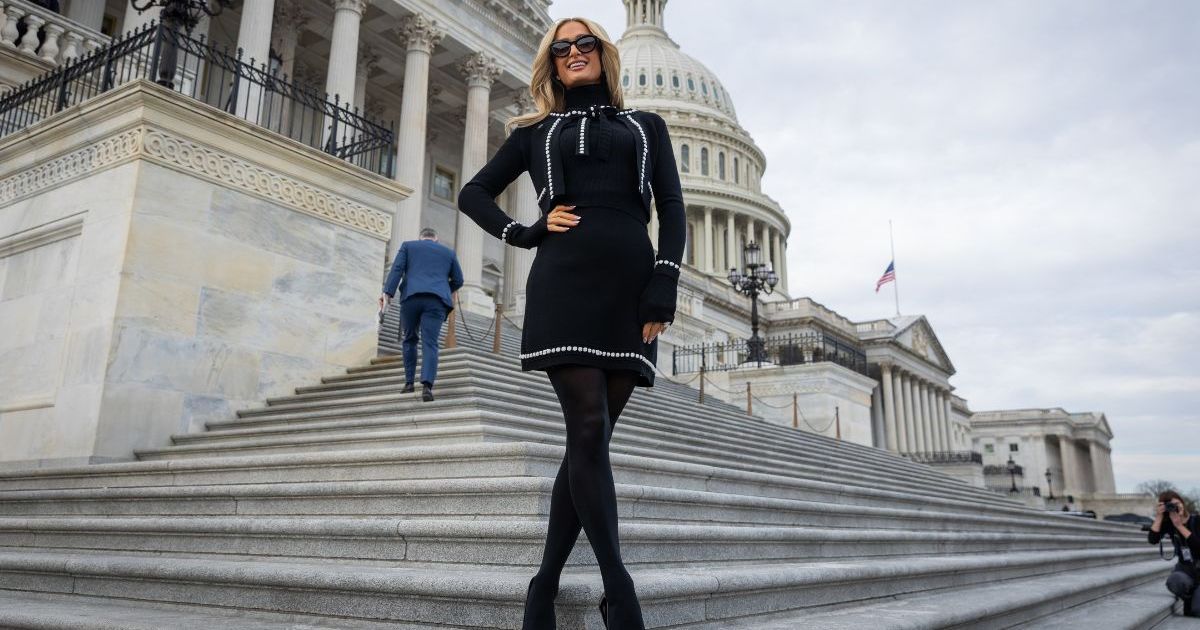 Paris Hilton Dons Tiny Miniskirt With Sheer Stockings for Capitol Hill