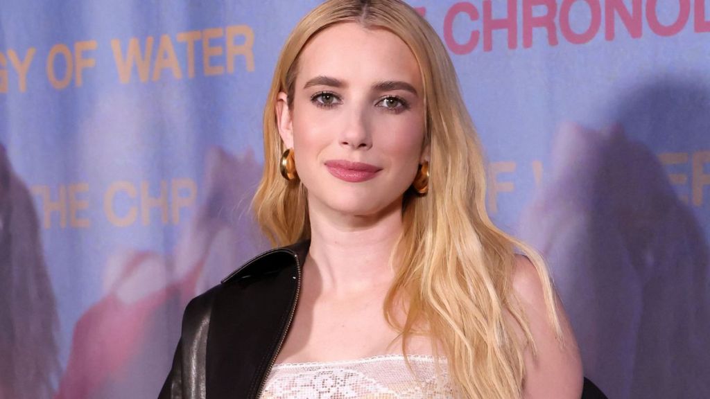 Emma Roberts Keeps It Edgy With Tiny Lace Minidress & Leather Jacket