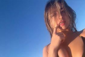 Tate McRae Enjoys Beach Day in Black Halter Bikini Top