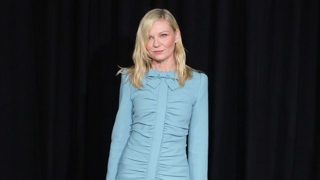 Kirsten Dunst Puts Playful Spin to Valentino Minidress With Snake Mules
