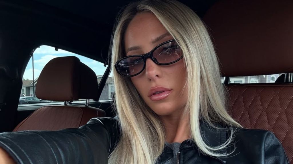 Alix Earle's Micro Shorts Are a Little Too Tiny in This Video