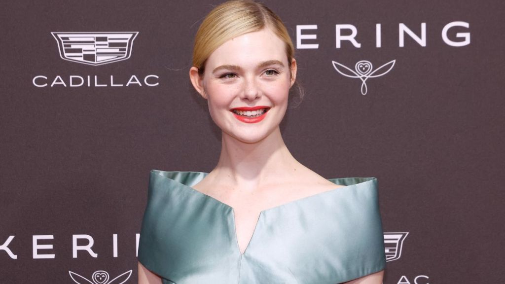 Elle Fanning Brings the Drama in Tiny Gucci Minidress & Fur Coats