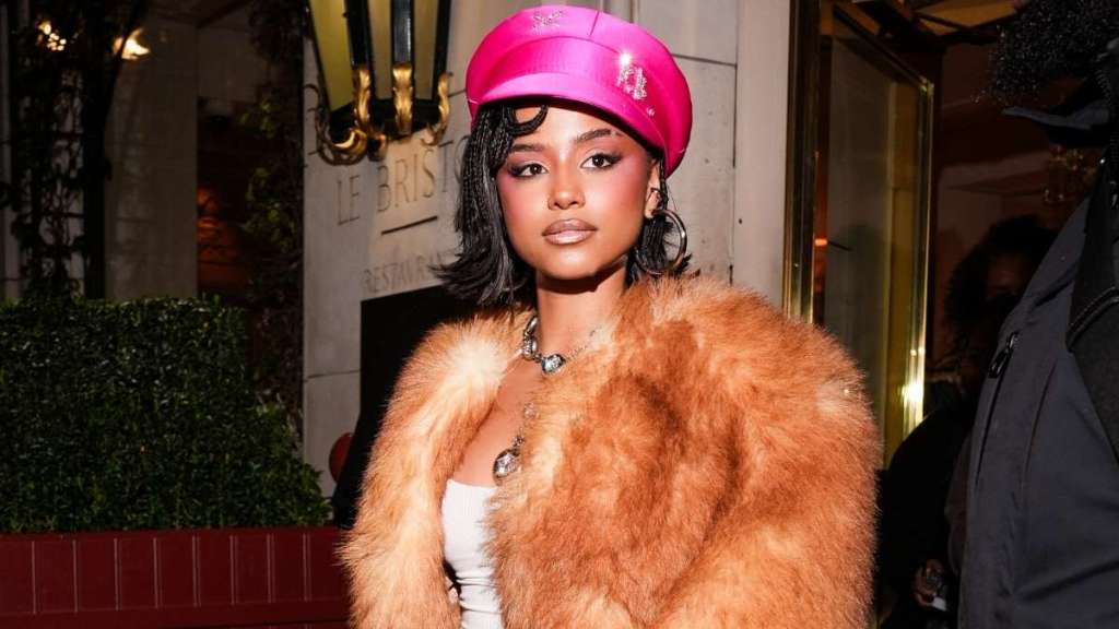 Tyla Adds Valentino’s Rockstud Heels to Bold Crop Top Look in Paris