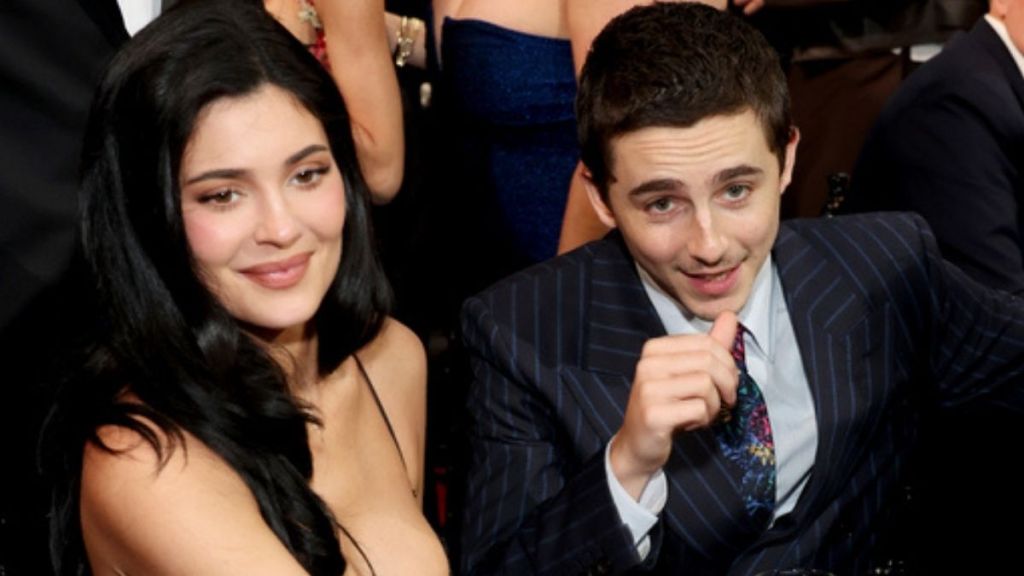 Video: Kylie Jenner & Timothee Chalamet Sneak in Cheeky Backstage Kiss