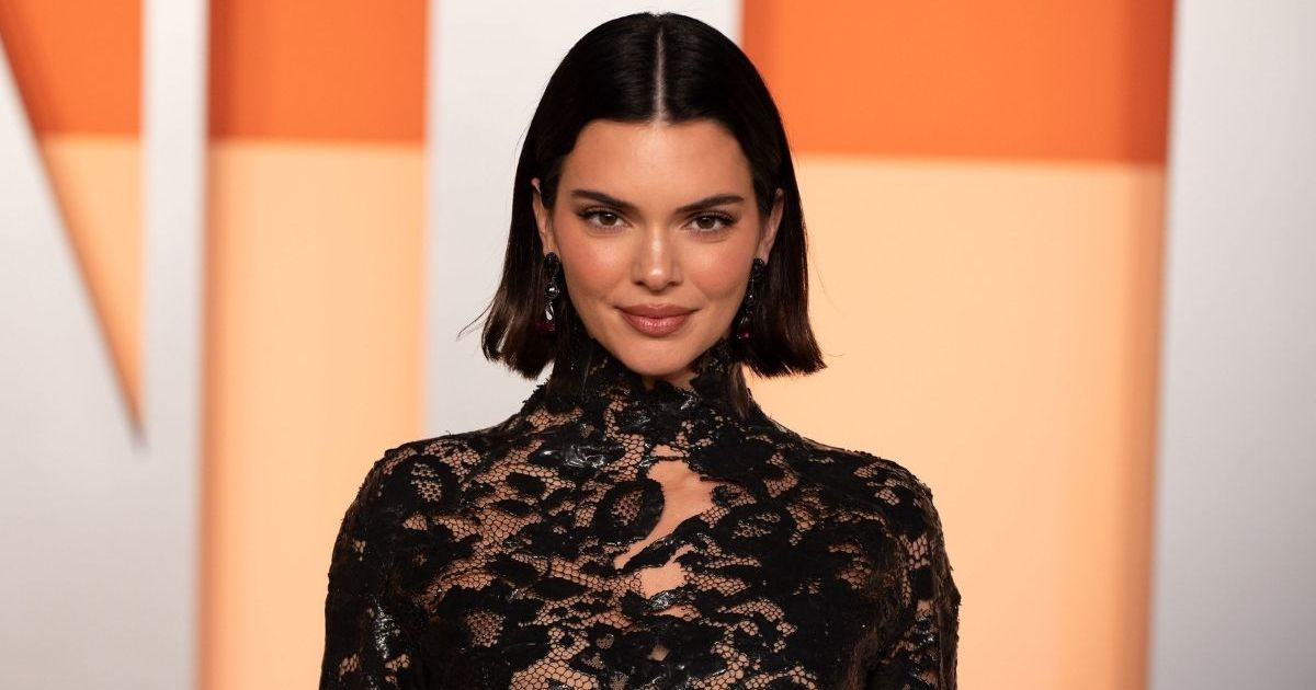 Kendall Jenner Lifts Top To Flash Cheeky Sports Bra