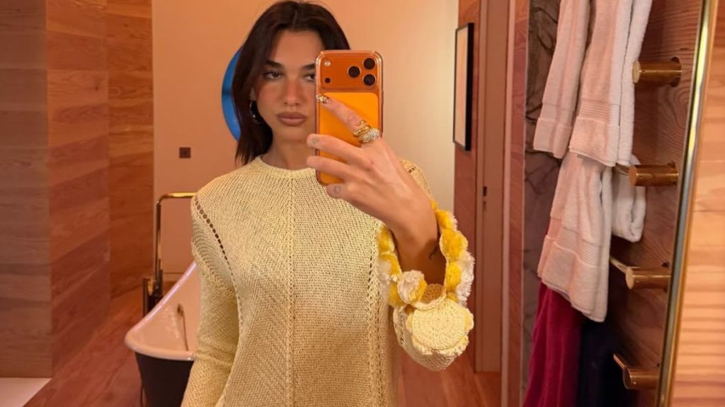 Dua Lipa Posing By a Porsche Proves She 'Rides in Style'