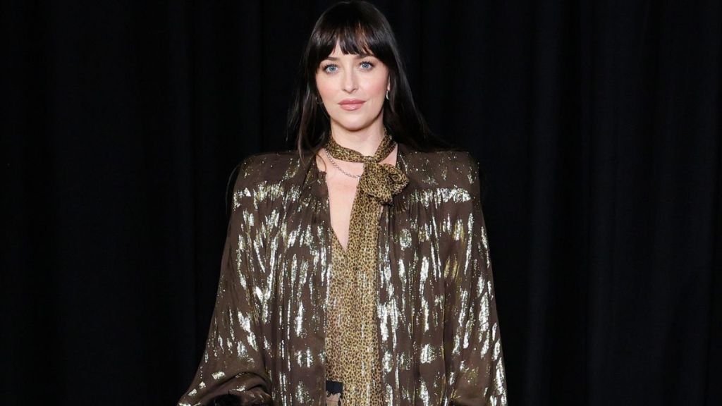 Dakota Johnson Is a Chic Mob Wife in Valentino Micro Shorts & Sheer Tights