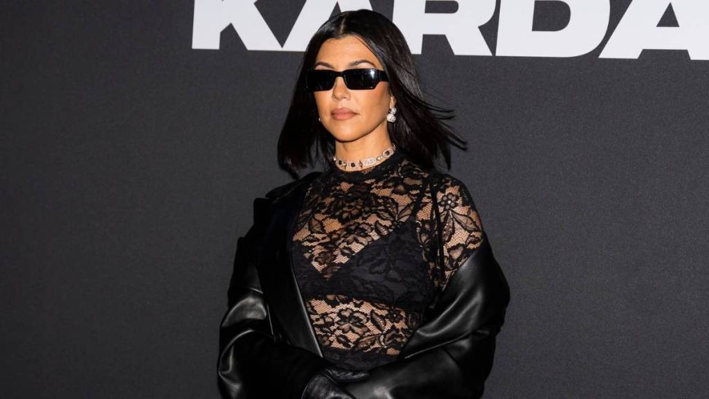 Kourtney Kardashian’s Tiny Minidress Gets Too Risky With $1K Sock Boots