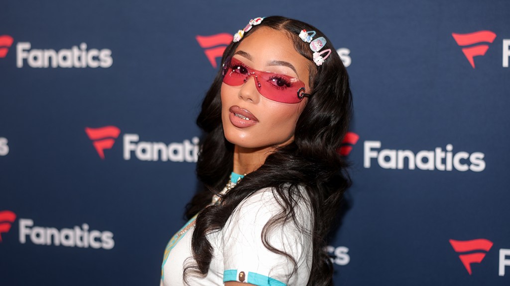 Coi Leray Goes Viral After Striking Pose in Yellow Mini-Dress