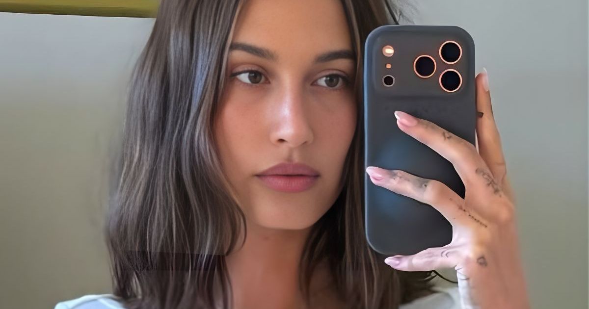 Hailey Bieber Posing in Bed With Just Blanket Is Must-See