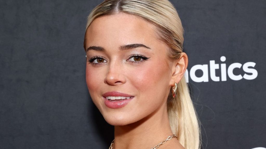 Livvy Dunne Shows Classics Aren't Going Anywhere With Striped Vuori Bikini