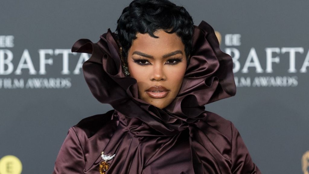 Teyana Taylor's Face Partially Covered by High Burberry Neckline at BAFTAs