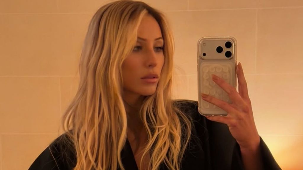 Alix Earle Goes Bold in Black Sheer Top While in Paris