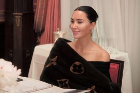 Kim Kardashian Goes Sleek in Strapless Top & Tights for Update