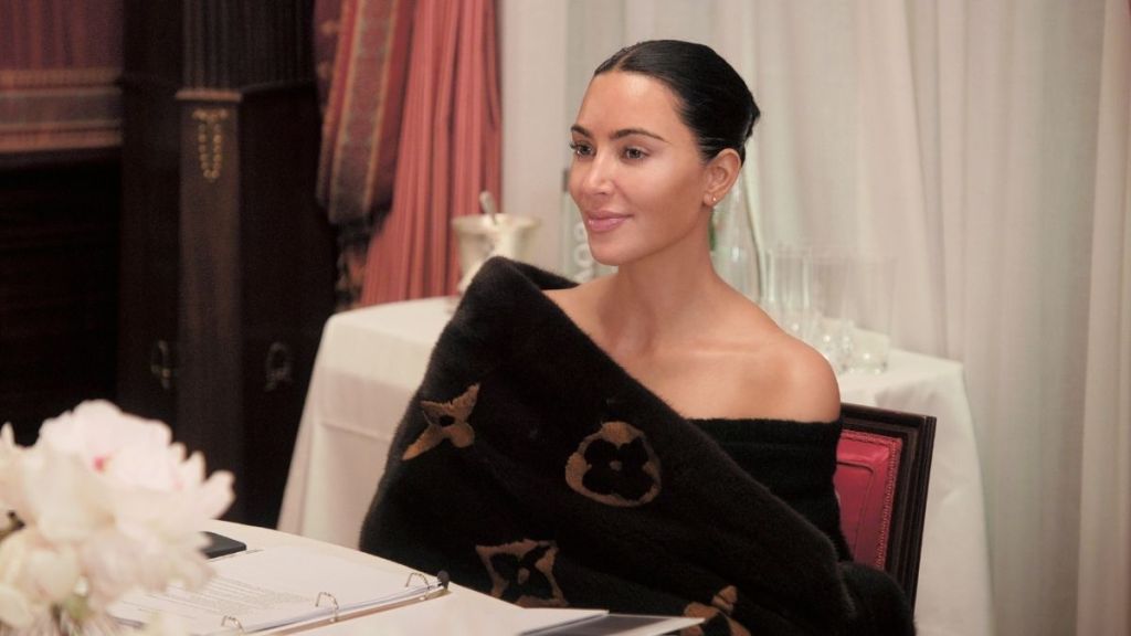 Kim Kardashian Goes Sleek in Strapless Top & Tights for Update