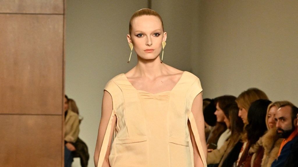 Alex Consani's Tory Burch Dress Highlights Hanging Straps