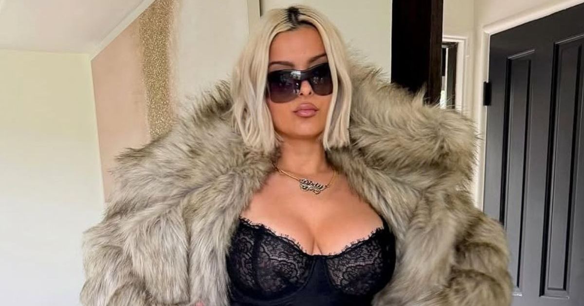Bebe Rexha Makes Waves Courtside in a Lacy Top
