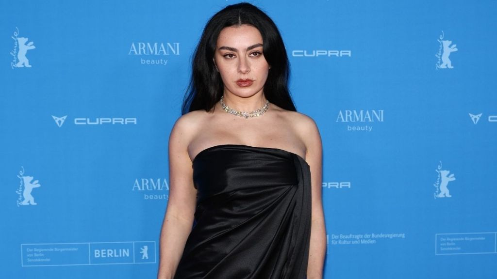 Charli XCX Showcases Bold Red Carpet Style in High-Slit Dress