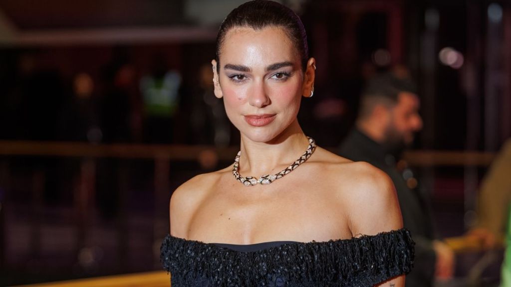 Dua Lipa Dazzles in Lacy Sheer Ensemble at Rosebush Pruning