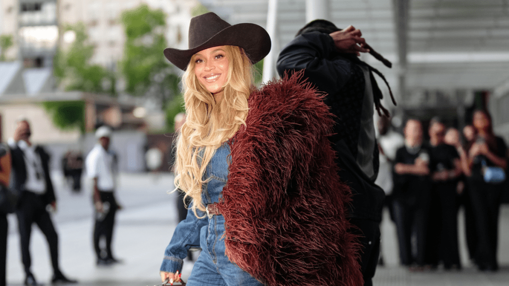 Beyonce Delivers Diva Moment in Rowen Rose Trench Coat & Fendi Shades